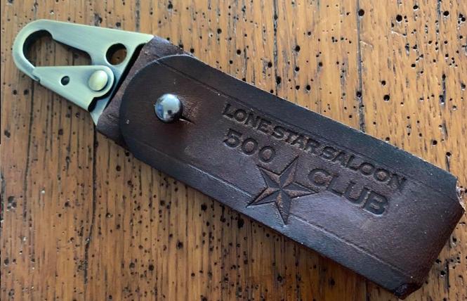 A handmade key strap, one of the new membership gifts at the Lone Star Saloon