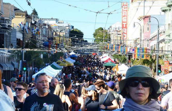 Crowds filled Castro Street during the 2018 fair. This year there will be a scavenger hunt people can access on their phones, and T-shirt sales to benefit nonprofits. Photo: Rick Gerharter  