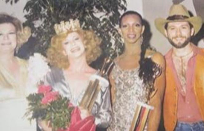 A photo from the Miss Gay Alabama pageant for 1980, taken in 1979 at the Ram's Head, a gay bar in Birmingham. In the image, from left, are Barbara Jean (Lady BJ), Mandy Lynn, and Bronzie De'Marco, who has been a drag performer in Alabama for more than 50 years. The man at right is unidentified. Photo: Courtesy Invisible Histories Project