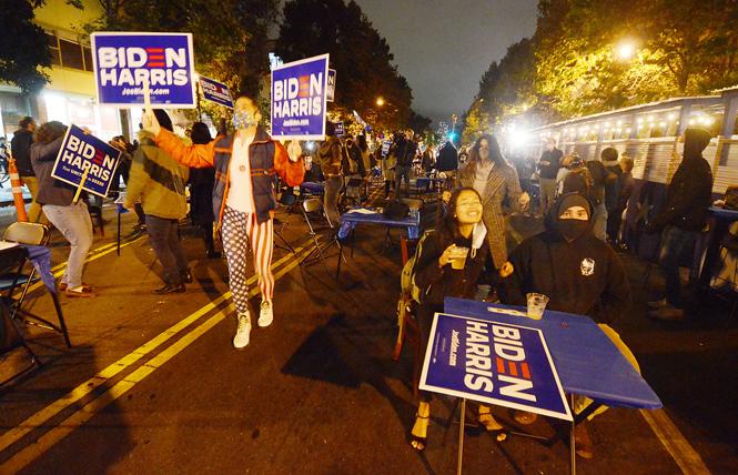 Marvin Dunson wore his most patriotic outfit to an election night street party on Valencia Street sponsored by Manny's Cafe. Photo: Rick Gerharter