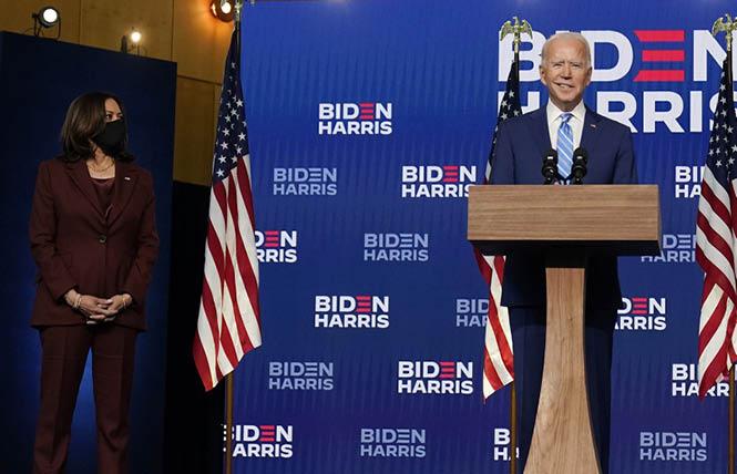 Joe Biden addresses reporters Wednesday in Wilmington, Delaware with his running mate, Senator Kamala Harris. Photo: Courtesy AP