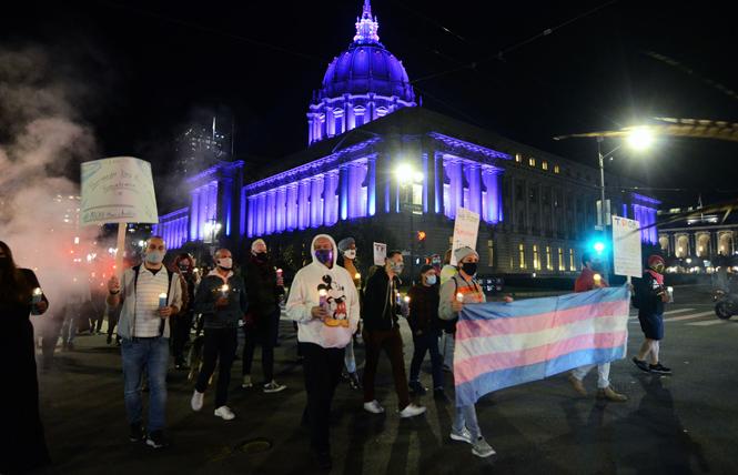 San Francisco City Hall was lit with the colors of the transgender flag during a march observing the Transgender Day of Remembrance Monday, November 16. Photo: Rick Gerharter