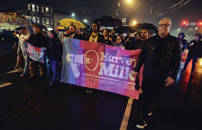 Cleve Jones, right, led the 2018 candlelight march down Market Street to City Hall, which recreated the march held in 1978 following the assassinations of Supervisor Harvey Milk and Mayor George Moscone. Photo: Rick Gerharter