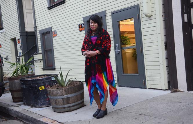 Casa Quezada resident Adriana Kin Romero has benefited from receiving a rent reduction this year under a policy a majority of San Francisco supervisors wants to permanently adopt. Photo: Rick Gerharter  