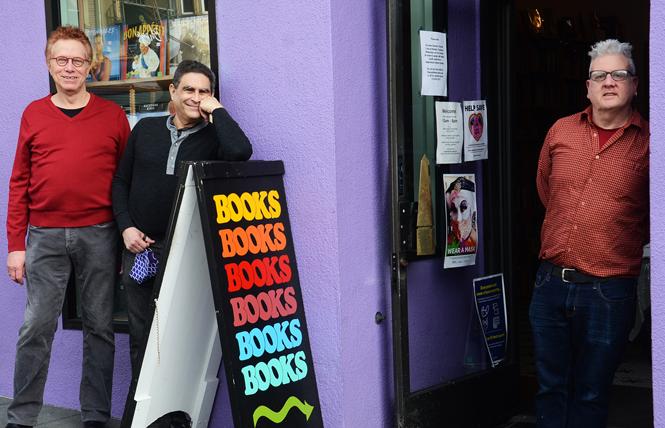 Rick May and Wayne Goodman, left, who joined manager Alvin Orloff, right, in front of Dog Eared Books on Castro Street, are celebrating the fifth anniversary of their Perfectly Queer reading series. Photo: Rick Gerharter