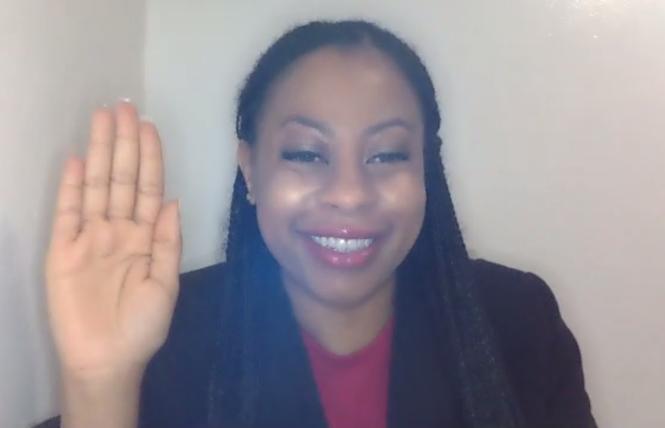 City College Trustee Shanell Williams raises her hand to take the oath of office for a second term; she was also reelected board president by her colleagues. Photo: Screengrab via Zoom