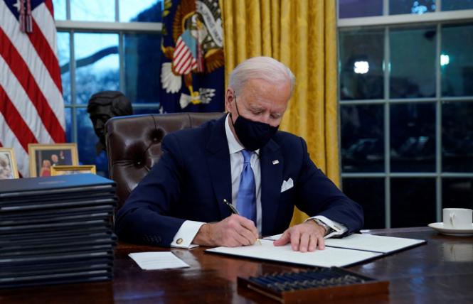 President Joe Biden signed 17 executive orders on his first day in office. Photo: AP