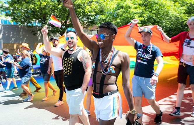 Marchers took part in the 2019 Seattle Pride parade. Photo: Nate Gowdy