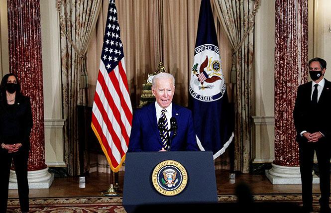 President Joe Biden spoke at the State Department February 4 and was joined by Vice President Kamala Harris, left, and Secretary of State Antony Blinken. Photo: Courtesy Reuters