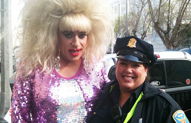 New Mission Station police Captain Rachel Moran, right, shared a moment with Heklina at the 2011 Pride parade. Photo: Courtesy SFPD