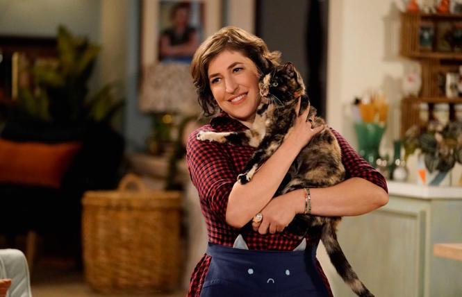 Mayim Bialik with a feline costar in 'Call My Kat'