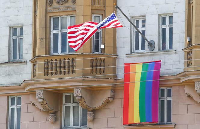 The U.S. flag and an LGBTQ pride flag flew on the front facade of the U.S. Embassy in Moscow last June. Photo: Courtesy Tass  
