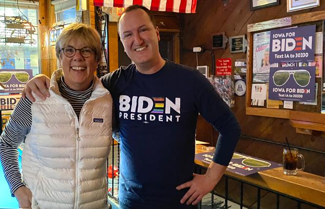 Jill Nash, a co-founder of Women for Biden, met an unidentified volunteer a Biden LGBTQ event at Blazing Saddles, a local bar in Des Moines. Photo: Courtesy Jill Nash
