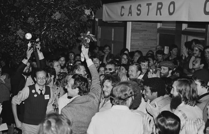 Harvey Milk holds a bouquet of flowers and is surrounded by supporters on election night 1977 when he won a seat on the San Francisco Board of Supervisors. Photo: Dan Nicoletta