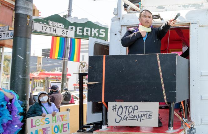 GAPA Chair Michael Trung Nguyen spoke at one of the recent rallies in the Castro against Asian American and Pacific Islander hate. Photo: Kevin Zhou