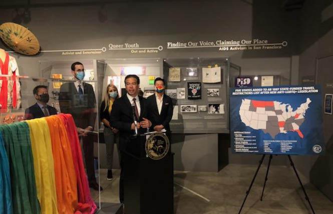 Attorney General Rob Bonta, at podium, held a news conference at the GLBT Historical Society in San Francisco's Castro neighborhood June 28, where he added five states to California's "no-fly" list. Photo: Matthew S. Bajko