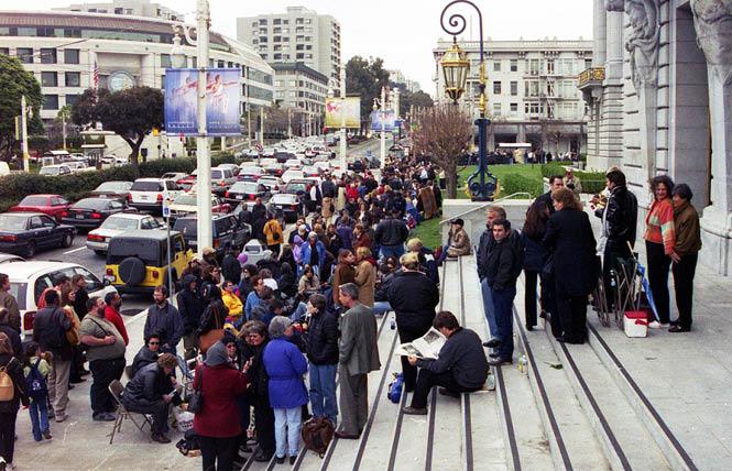 Same-sex couples lined up outside San Francisco City Hall in February 2004 waiting to wed. Those marriages were later voided by the California Supreme Court. Photo: Rick Gerharter