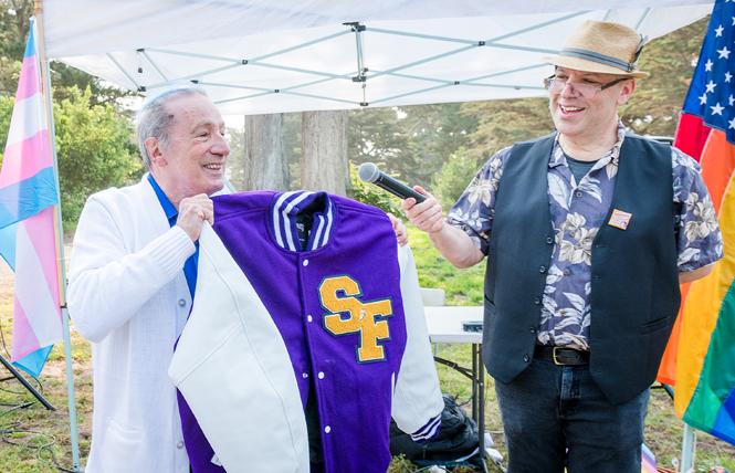 Former assemblyman and San Francisco supervisor Tom Ammiano, left, wore his Immaculate Conception letter jacket and was presented with a letterman's jacket by Stephen Saxon on behalf of San Francisco FrontRunners at the Pride Run event in Golden Gate Park Saturday, August 28. Photo: Christopher Robledo