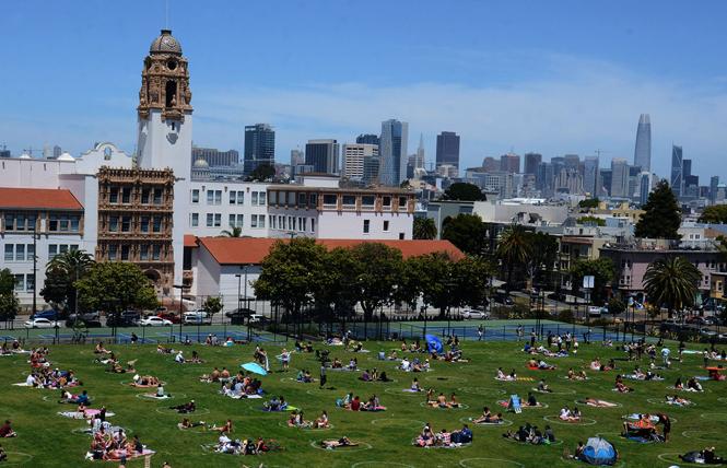 People practiced physical distancing in Mission Dolores Park last spring. Photo: Rick Gerharter