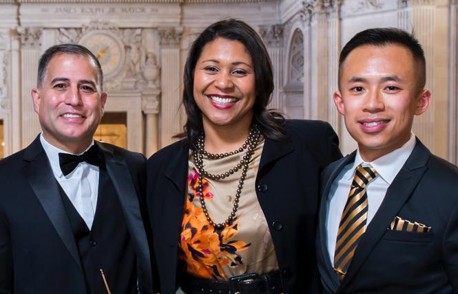 Assistant District Attorney Gregory Stuart Flores, left, Mayor London Breed, and Film Commissioner Jack Song attended an event at City Hall. Photo: Courtesy Jack Song