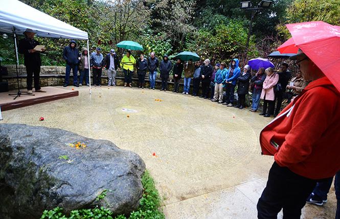 Newly engraved names in the Circle of Friends were read during activities on World AIDS Day in 2019 at the National AIDS Memorial Grove in Golden Gate Park. Photo: Rick Gerharter