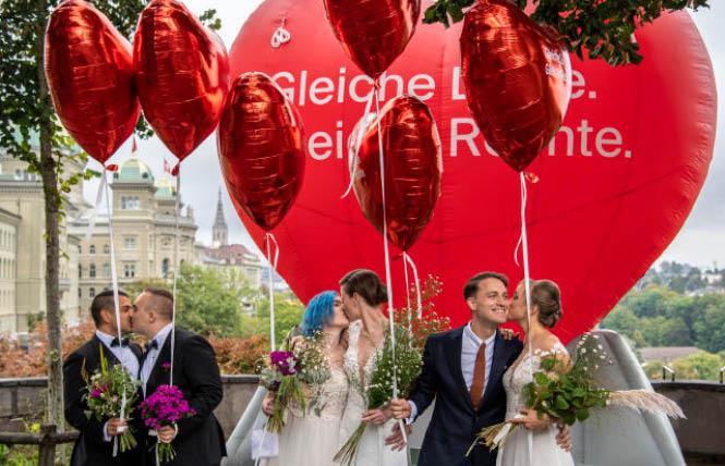 Operation Libero staged a photo opportunity of marriages with three different couples, in Bern, Switzerland on September 26. Photo: Peter Schneider/AP