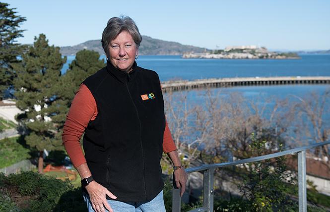 Christine Lehnertz, president and CEO of the Golden Gate National Parks Conservancy, stood at Black Point Historic Gardens in Fort Mason December 10. Photo: Christopher Robledo