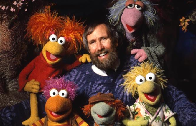 Jim Henson with puppets from 'Fraggle Rock' 