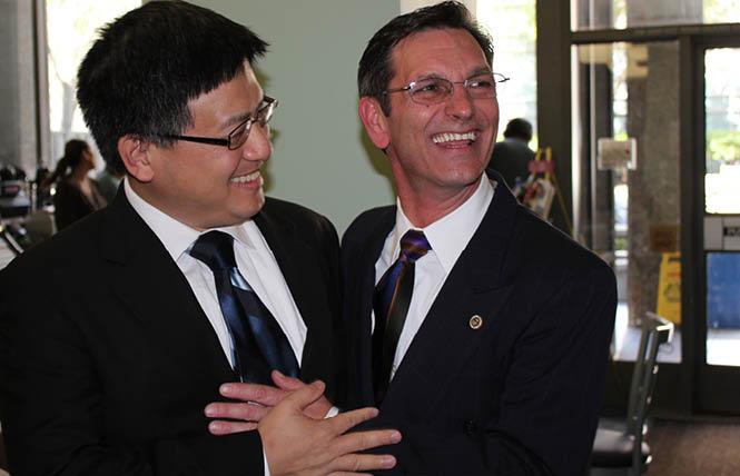 Kenneth William Topper, right, enjoyed a laugh with former state Controller John Chiang at Mr. Topper's retirement party in 2012. Photo: Courtesy Matthew Whitley<br>