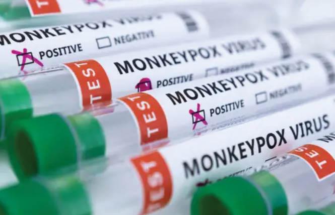 Test tubes labeled "Monkeypox virus positive and negative" are seen in this illustration taken May 23, 2022. Photo: Courtesy Reuters via CNBC<br>