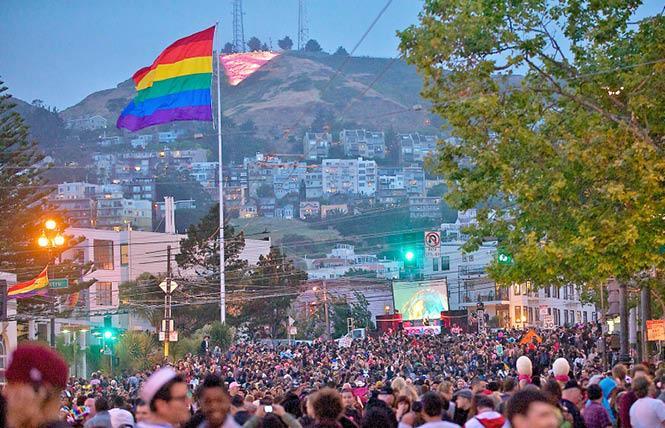 Pink Saturday drew a crowd in 2011, with the illuminated pink triangle on Twin Peaks in the background. Photo: Jane Philomen Cleland<br> 
