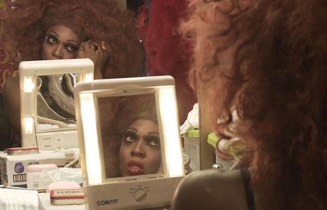BeBe Zahara Benet prepares for a show in her dressing room in Minneapolis in 2014 in a scene from the documentary, "Being BeBe." Photo: Courtesy Emily Branham/Serve Productions<br>