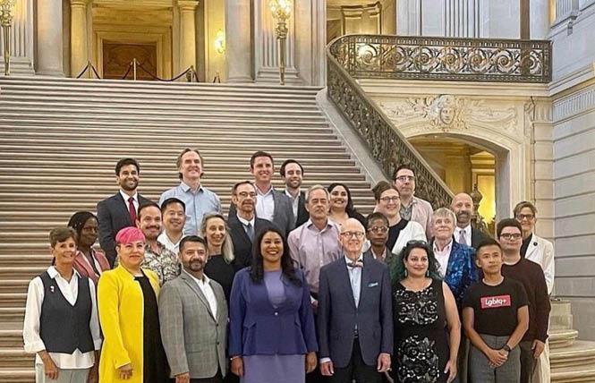 San Francisco Mayor London Breed, fourth from left, posed for photos with LGBTQ city commissioners June 21, a day before she tested positive for COVID-19. Photo: Courtesy Facebook