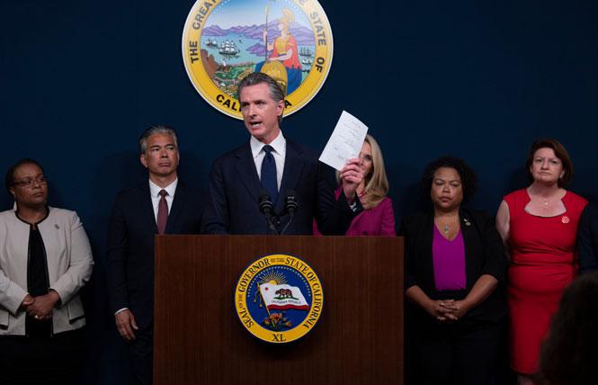Governor Gavin Newsom, flanked by state leaders, talked about the U.S. Supreme Court's Dobbs v. Jackson Women's Health Organization decision that overturned Roe v. Wade during a June 24 news conference. Photo: Courtesy Governor's Office