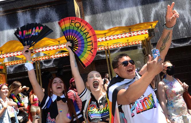 Crowds enjoy the San Francisco Pride parade June 26, but LGBTQ sports groups and others were left out of beverage sales this year. Photo: Rick Gerharter