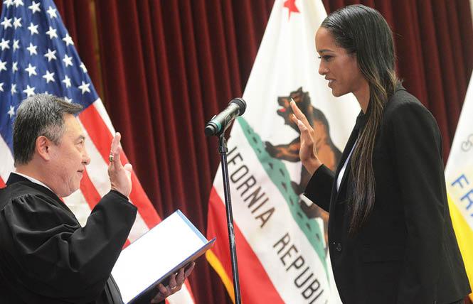 San Francisco Superior Court Presiding Judge Samuel Feng administers the oath of office to San Francisco District Attorney Brooke Jenkins July 8 at City Hall. Photo: Rick Gerharter
