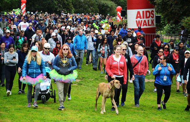 Walkers start the 6.2-mile route of the San Francisco AIDS Walk in Golden Gate Park on July 14, 2019. Photo: Rick Gerharter<br><br>