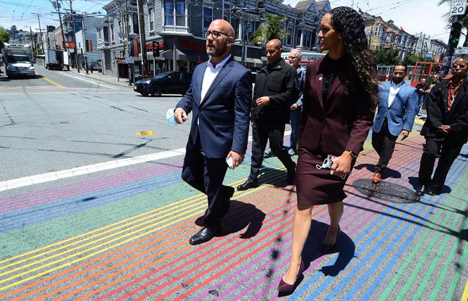 San Francisco District Attorney Brooke Jenkins, right, was joined by Supervisor Rafael Mandelman during a walking tour of the Castro July 19. Photo: Rick Gerharter<br>