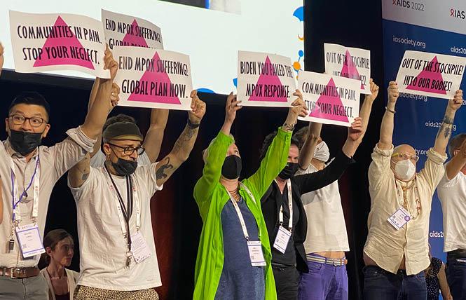Activists demanded more monkeypox vaccines and more equitable distribution as they protested at the International AIDS Conference in Montreal August 1. Photo: Liz Highleyman