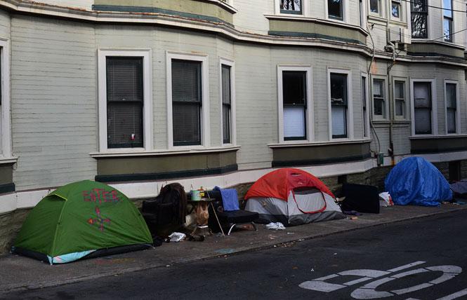 In May 2020, tents appeared on narrow Prosper Street near the Harvey Milk Branch Library. The Castro Merchants Association wrote in a recent email to city officials that problems associated with unhoused residents in the LGBTQ neighborhood have become untenable. Photo: Rick Gerharter