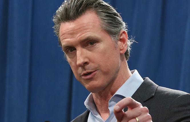 Governor Gavin Newsom signed bills Tuesday aimed at addressing anti-bias incidents and expanding the collection of sexual orientation and gender identity data. Photo: Courtesy AP