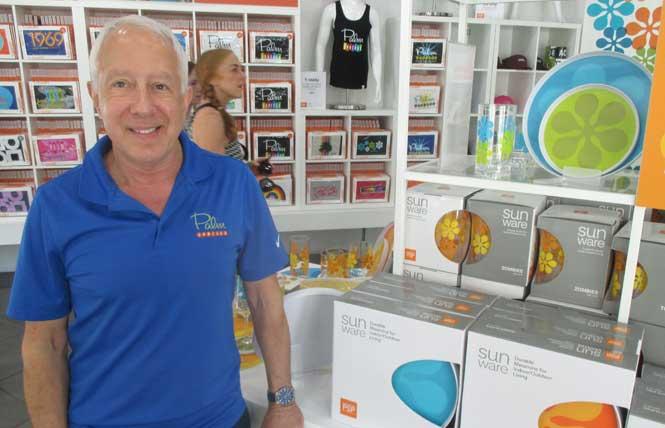 Destination PSP founder Jeffrey Bernstein stands next to a display of dinnerware in his shop. Photo: Ed Walsh