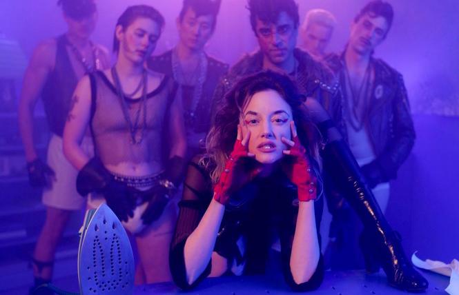 Andrea Riseborough and cast members in 'Please Baby Please'