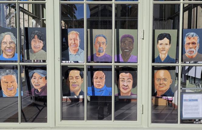 Some of the images in the public art installation "Ordinary People" are shown in the Art Kiosk in Redwood City. Photo: Peter Moen