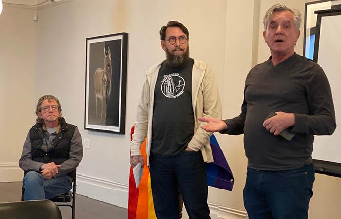 Castro Merchants Association board member Terry Beswick, right, and Robert Emmons, center, discussed a proposal for Emmons to open a pop-up store in the Castro at the merchants' February 2 meeting. Photo: John Ferrannini