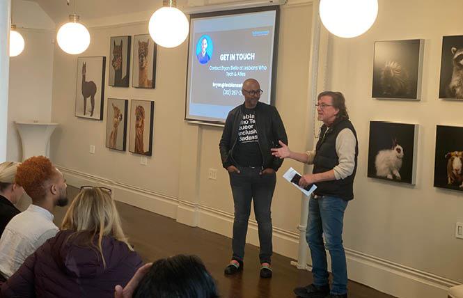 John Juarez, left, of Lesbians Who Tech & Allies, joined Castro Merchants Association President Terrance Alan at the business group's March 2 meeting to discuss the tech group's plans for its fall conference in the LGBTQ neighborhood. Photo: John Ferrannini