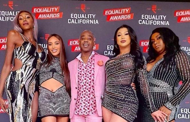 Ronnie Reddick is surrounded by the girls of AsiaSF at an Equality California event. Photo: Courtesy Ronnie Reddick