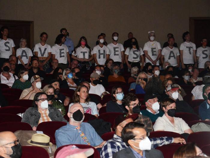People wore T-shirts that spelled out "Save the Seats" at an August 2022 town hall at the Castro Theatre. Photo: Rick Gerharter