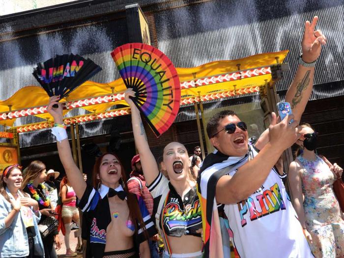 An exuberant crowd watched last year's SF Pride Parade on Market Street. Photo: Rick Gerharter