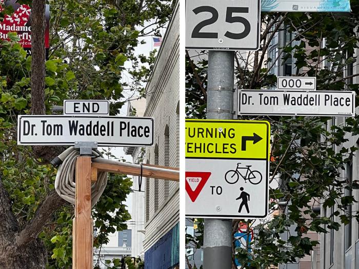 The new temporary signs for Dr. Tom Waddell Place show the late gay activist's name, left, at the Van Ness end of the alley, and with tape covering former Polish president Lech Walesa's name at the Polk Street end. Photos: Matthew S. Bajko